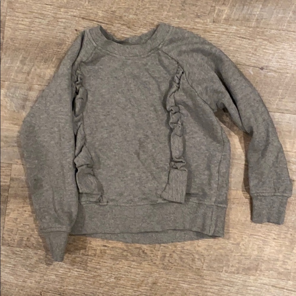 Girls ruffle sweatshirt.